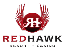 Logo for Red Hawk Resort & Casino featuring a red circle with stylized white letters “RH” and red hawk wings extending from the sides. The words Red Hawk are written below in red and black text.